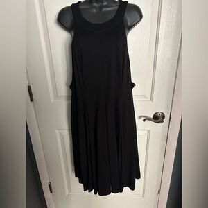 TORRID Simple, tasteful black dress, 2 pockets, pleated, size 4. EUC.